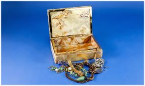 Selection of Costume Jewellery contained in an onyx box.