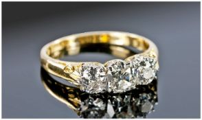 18ct Gold Three Stone Diamond Ring, Set With A Central Modified Cushion Cut Between Two Round Cut