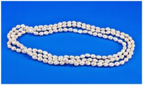 Long Rope of Ivory White Baroque Freshwater Pearls, 60 inch long continuous strand of lustrous