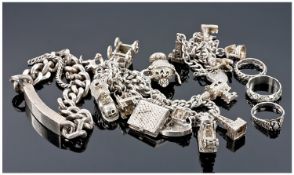 Small Quantity of Silver, comprising two silver charm bracelets, one ID bracelet and four various