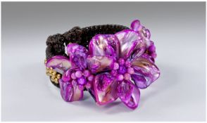 Fuchsia Mother of Pearl Cuff Bracelet, three flowers of mother of pearl petals centred by a cluster