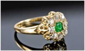 18ct Gold Emerald And Diamond Ring, Set With A Central Cushion Cut Emerald, Surrounded By Eight Old