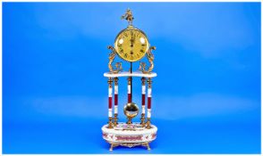 French Nineteenth Century Style Ceramic and Brass Mantel Clock. Stands 19.5 inches high.