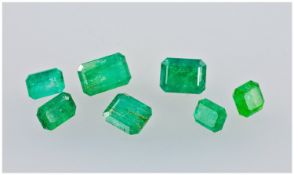 Loose Gemstones, Collection Of Seven Emerald Cut Emeralds. Estimated Weight 11.32cts