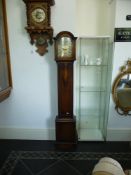 Early 20th Century Oak Cased Grandmother Clock, with domed top, glazed door opening to reveal brass