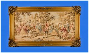 Framed Tapestry. Various figures in a garden scene. Approximately 17.5x35 inches.