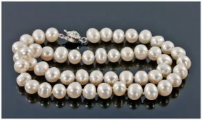 White Cultured Akoya Pearl Necklace  Length 18 Inches.