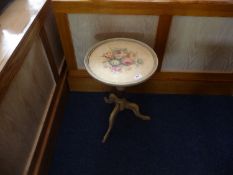 Small Cream Painted Wine Table, the circular top painted with roses, raised on a tripod base,
