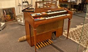 Wurlitzer Electric Organ, with a range of various settings, with two keyboards, each with 3½