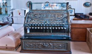 Early 20th Century Manual Till, the top with pressed curving lid, price keys below, with drawer to