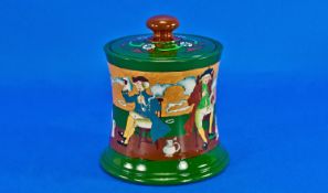 Foley Intarsio Lidded Comical Figural Tobbaco Jar. Reg. number 364386. Depicts comical figures