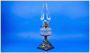 Late Victorian Oil Table Lamp, baluster funnel, moulded base, with glass bowl, 19 inches high.