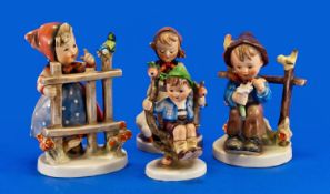 Four Various Hummel Figures comprising `Signs of Spring`, girl in blue polka dot apron and red