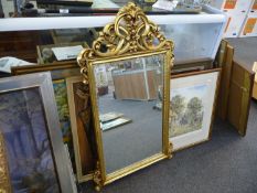 Gilt Framed Wall Mirror, fitted with bevelled edge glass, scrollwork to top of frame, 37 inches