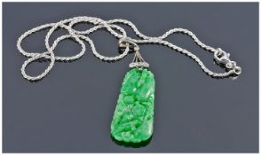 Very Fine Royal Jade and Diamond Pendant set in Platinum. Supported on a fine platinum chain.