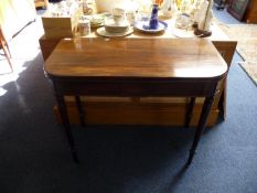 Early 19th Century Mahogany Fold Over Card Table, raised on turned legs, 29 inches high, 36 wide