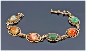 Ladies Yellow Metal Stone Set Bracelet, Set With Polished Hard Stone Coloured Stones.