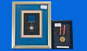 Military Interest, Two Framed Medals, Reproduction George Cross And A WW2 German Merit.