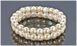 White Cultured Pearl Two Row Bracelet, slightly domed lustrous coin pearls woven onto jeweller`s