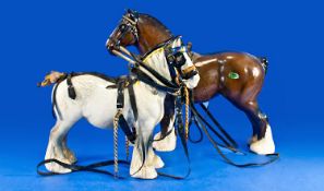 Two Large Beswick Horses, one in brown, with reins, together with a white horse, also of large