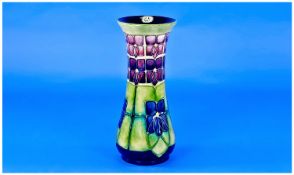 Moorcroft Violets Waisted Vase, three large, geometrically stylised blue/purple violets on a ground