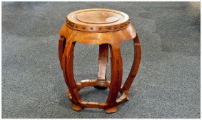 A Fine Chinese Rosewood Low Stand in the shape of a drum, with solid panelled amboyna tops and