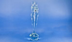 Signed Art Glass Figure Group, a semi-abstract couple shown in a standing embrace, applied to a