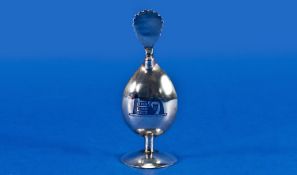An Egyptian Silver And Niello Scent Holder. Mango shaped on a pedestal foot with a flame type screw