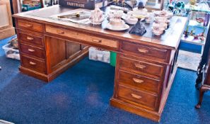 Large Early 20th Century Walnut Partners Desk, fitted with long central drawer and flanked to each