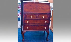 Early 20th Century Walnut Bureau, the fall opening to reveal fitted interior of drawers and pigeon