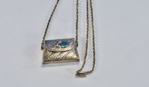 A Silver Plated Stamp Holder Designed As A Miniature Bag with hinged lid decorated with a blue