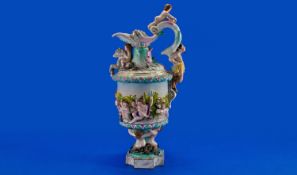 Volkstedt Style Goblet Shaped Ewer, the main body, decorated with a raised panorama of frolicking