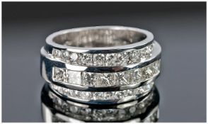 18ct White Gold Diamond Dress Ring, Set With A Central Row Of 8 Princess Cut Diamonds Set Between