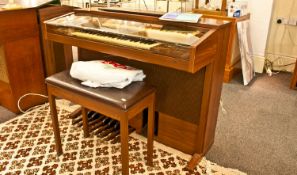 Yamaha Electone Electric Organ with piano seat and sheet music.