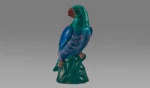 Mintons Late 19th Century Lustre Parrot Figure, blue, green & pink colourway. Marks to base.