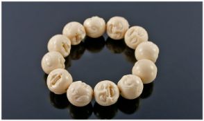 Two Carved Style Bone Beads.