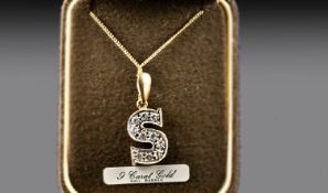 9ct Gold Letter ``S`` Pendant, Set With CZ Stones, Suspended On A Fine Link Chain.