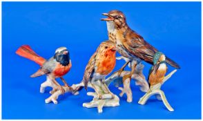 Goebel Collection of Bird Figures (4) in total 1. Song Thrush 6.5 inches high 2. Robin, 5 inches