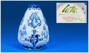 Macintyre. William Moorcroft Signed Florian Ware Vase. ``Iris`` pattern. c.1900. 6.25 inches high.