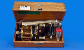 Ambassadeur De Luxe 5000 Fishing Reel in fitted wood case with accessory; marked: ABU Ambassadeur