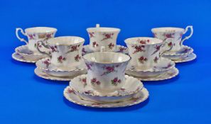 Richmond Part Teaset comprising 6 cups, saucers and side plates. Pretty pink floral design on white