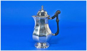 Edwardian Lidded Silver Water Jug of faceted and shaped form. Hallmark London 1912. Makers mark G