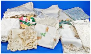 Box of Assorted Linen and Lace including doilies, table cloths and seat covers.