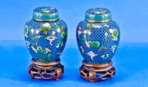 A Pair Of Small Chinese Cloisonne Lidded Jars, of globular form. Decorated in turquoise enamels