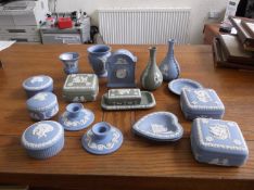 Collection of Wedgwood Jasper Ware comprising small mantel clock, pair of square trinket boxes,