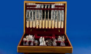 Garrard`s Oak Cased Canteen of Cutlery, containing a six place set, the lid inscribed to top B.T.R,