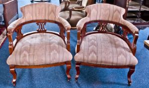 A Matching Pair of Walnut Edwardian Parlour Easy Chairs on Cabriole Legs, with a Tab Shaped Back