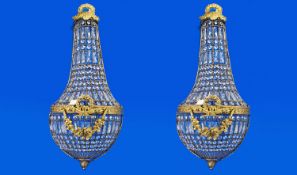 Pair of Classical Style Ormolu Wall Lights, each surrounded with crystal glass pieces, each