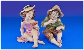 Capo Di Monte Fine Hand Painted Figures (2 in total). Country boy and girl. Signed B. Merli. Each