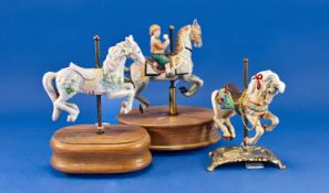 Two Musical Horse Figures, each raised on a wooden plinth, together with a further horse figure,